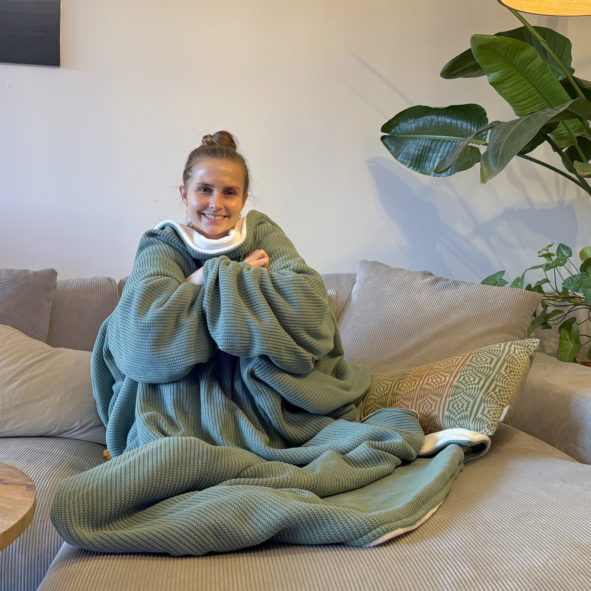 Kuscheldecke mit Ärmeln · Baumwollstrick · Seegrün