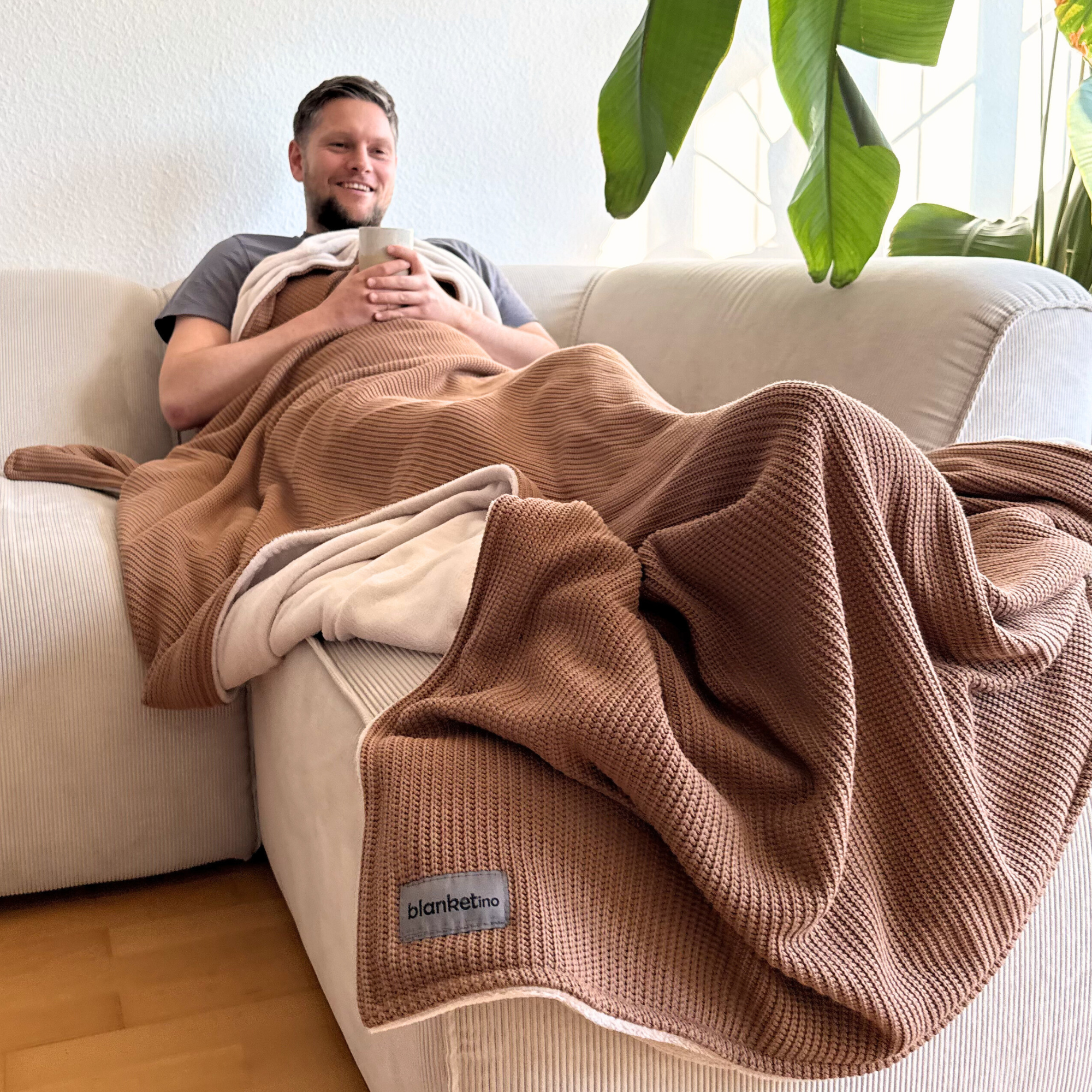 Kuscheldecke mit Baumwollstrick · Terracotta · Beige