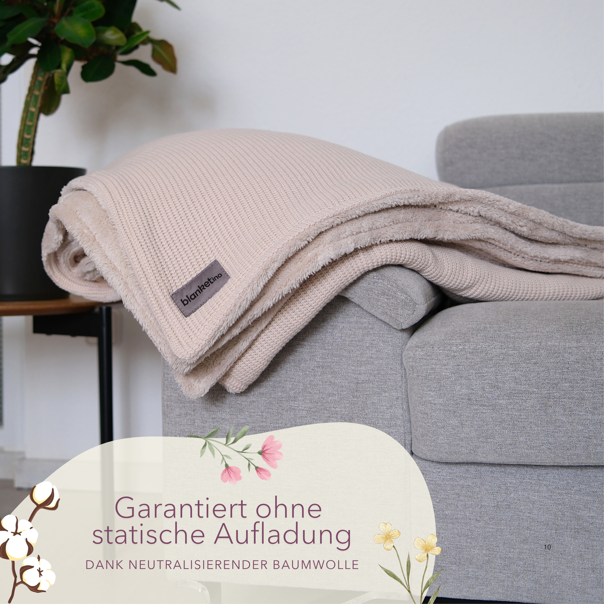 Kuscheldecke mit Baumwollstrick · Creme