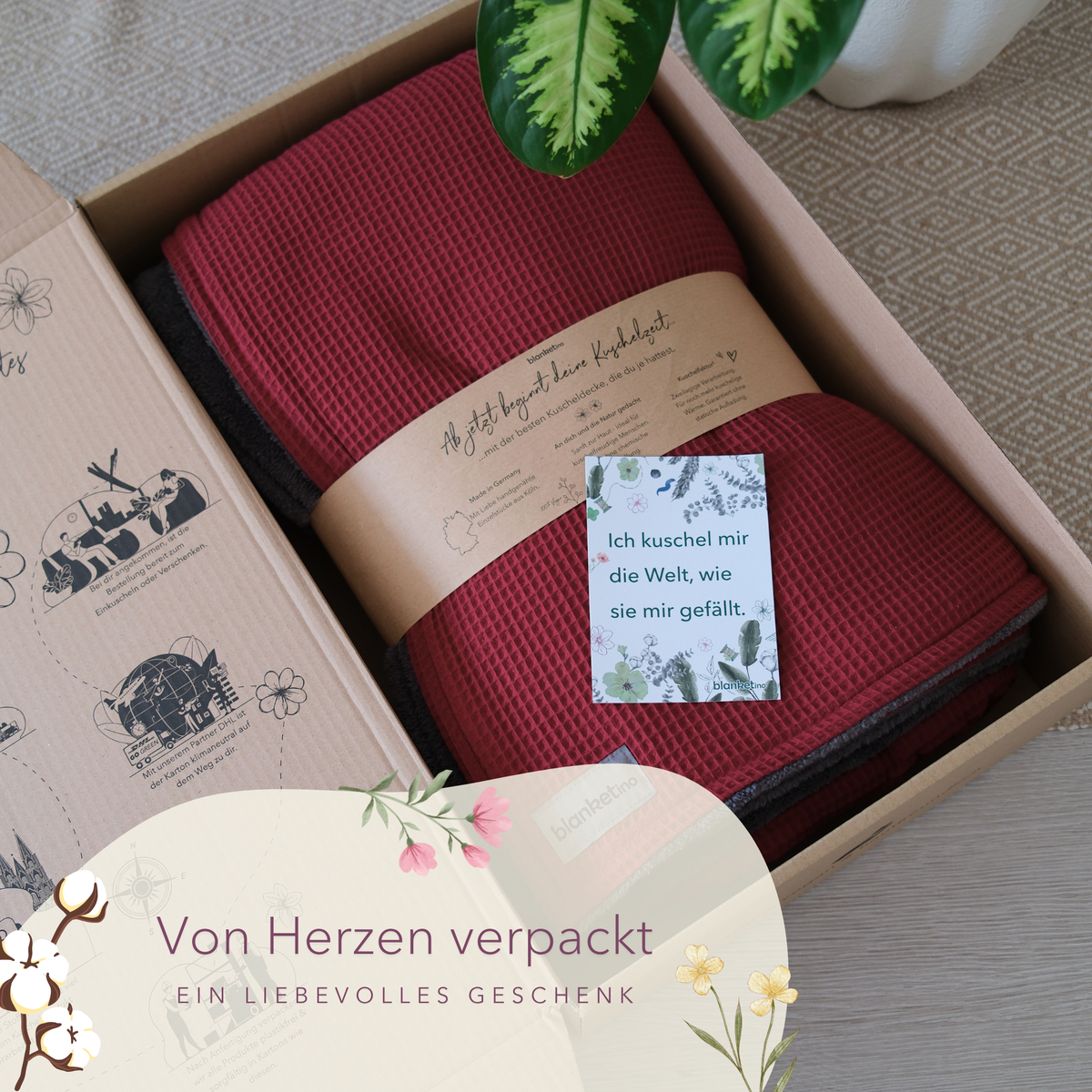 Weiche Kuscheldecke "Vollkommen" in Weinrot und Stahlgrau von blanketino.de, perfekt zum Kuscheln und als Geschenk.